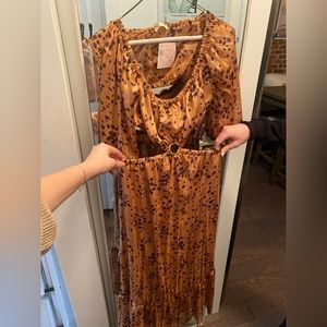 Boutique in Hilton Head, Maxi cheetah dress with cut outs, size medium